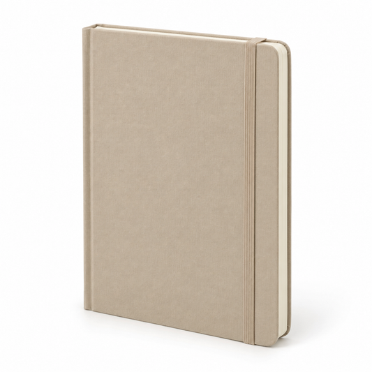Sand beige hardcover notebook with elastic closure on white background
